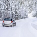 Winter driving conditions showing snowy mountain road